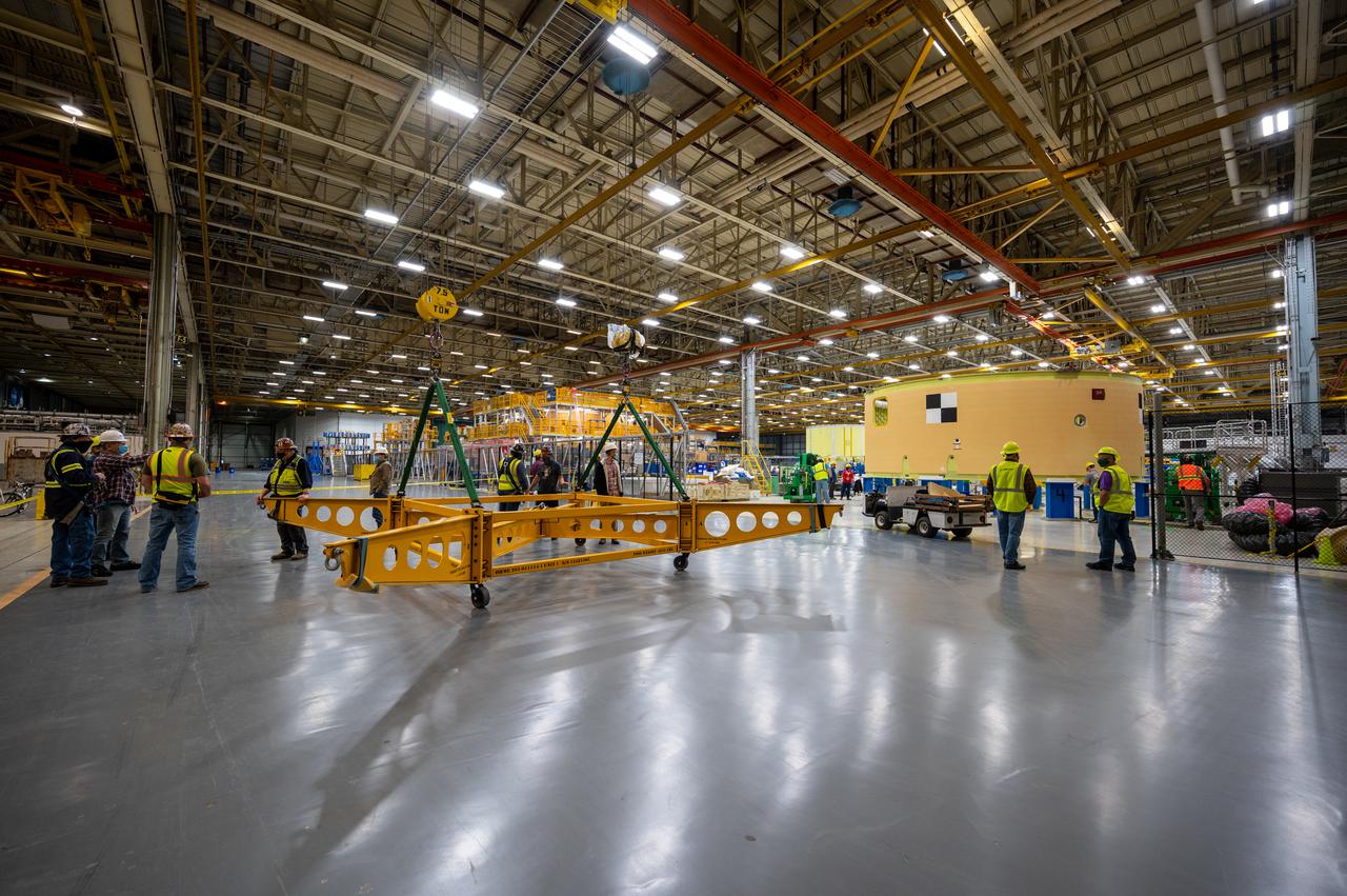 This image shows the forward skirt that will be used on the core stage of NASA’s Space Launch System rocket for Artemis II, the first crewed mission of NASA’s Artemis program, at NASA’s Michoud Assembly Facility. The SLS core stage is made up of five unique elements: the forward skirt, liquid oxygen tank, intertank, liquid hydrogen tank, and the engine section. The forward skirt houses flight computers, cameras, and avionics systems. The hardware is located at the top of the 212-foot-tall core stage and connects the upper part of the rocket to the core stage. Soon, technicians will ready the forward skirt for the first of three core stage assembly mates called the forward join. The forward join consists of three main parts -- the forward skirt, liquid oxygen tank, and intertank – to create the top, or forward part, of the core stage.  Together with its four RS-25 engines, the rocket’s massive 212-foot-tall core stage — the largest stage NASA has ever built — and its twin solid rocket boosters will produce 8.8 million pounds of thrust to send NASA’s Orion spacecraft, astronauts and supplies beyond Earth’s orbit to the Moon and, ultimately, Mars. Offering more payload mass, volume capability and energy to speed missions through space, the SLS rocket, along with NASA’s Gateway in lunar orbit, the Human Landing System, and Orion spacecraft, is part of NASA’s backbone for deep space exploration and the Artemis lunar program. No other rocket is capable of carrying astronauts in Orion around the Moon in a single mission.